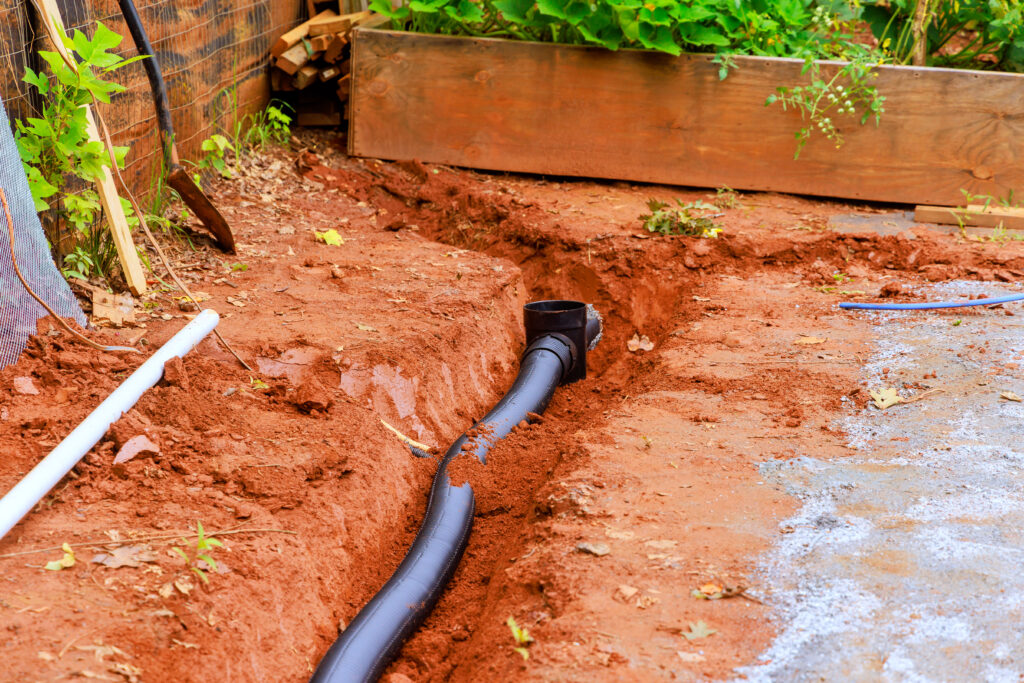 An open trench is dug for the purpose of laying drainage pipes for a stormwater