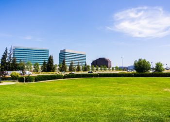 Urban park in Silicon Valley; city skyline in the background; Santa Clara, south San Francisco bay area, California